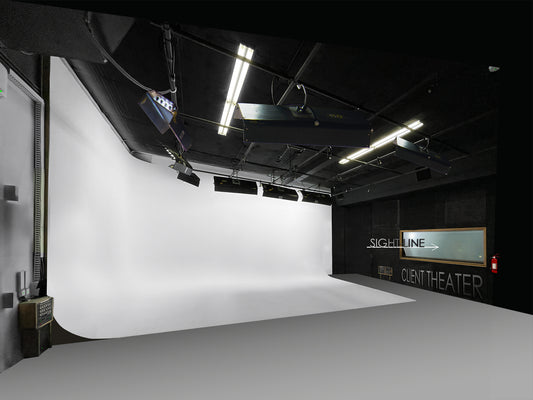 Dolby Sound stage single cove cyclorama with kino flo daylight balanced lighting in grid. DMX ready. Perspective of the single cove - south west view. Inside the heart of Oceanside, California's brand new Media Arts District.