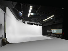 Load image into Gallery viewer, Dolby Sound stage single cove cyclorama with kino flo daylight balanced lighting in grid. DMX ready. Perspective of the single cove - south west view.  Inside the heart of Oceanside, California&#39;s brand new Media Arts District.